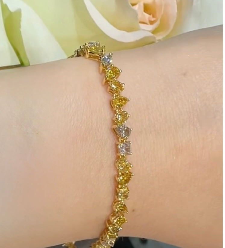 18k gold Yellow & Pink fancy color diamond tennis bracelet