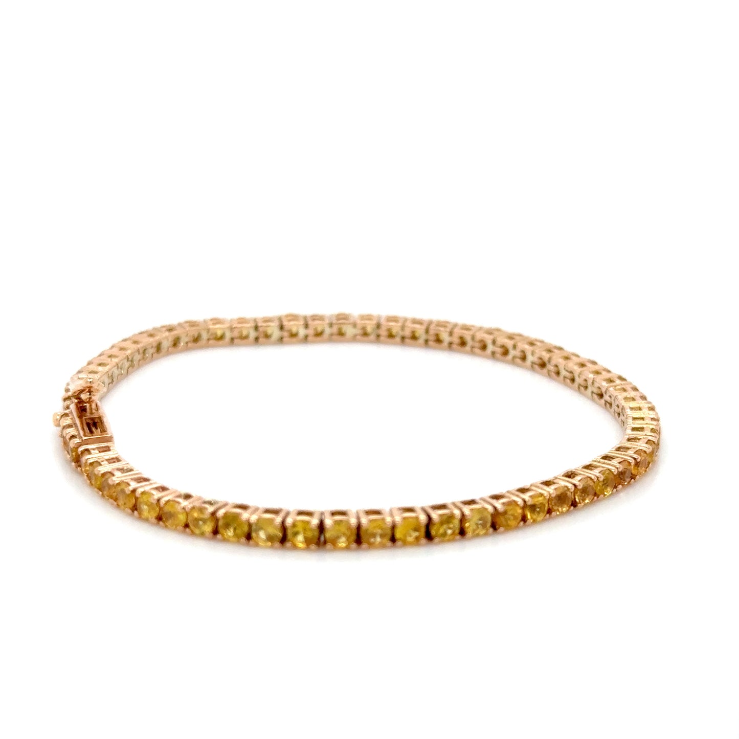 Yellow sapphire gold tennis bracelet