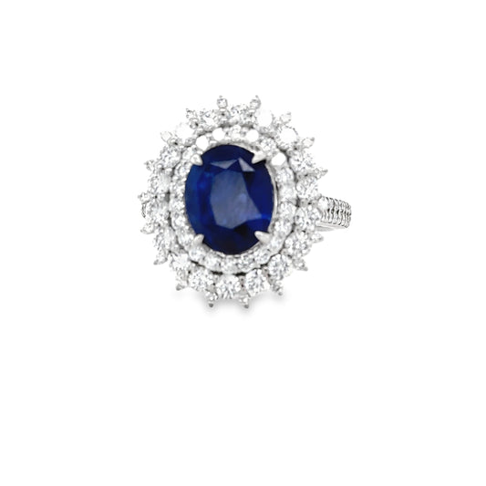 3.95 Carat Royal Blue Oval Sapphire and Diamond White Gold Cluster Ring